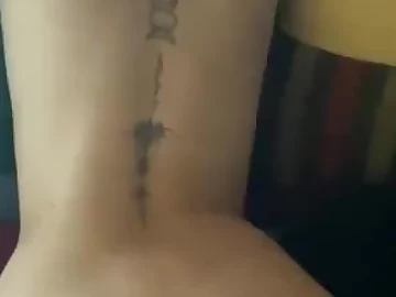 Sassy babe with a back tattoo slammed from behind hardcore